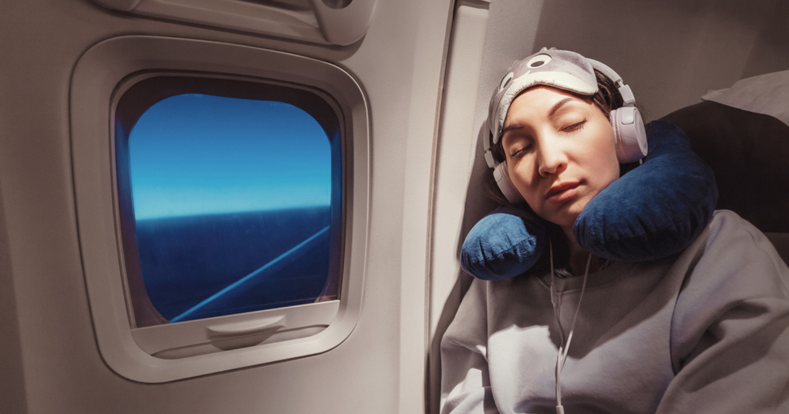 What To Wear On Long Flights girl sleeping